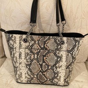 This is a beautiful CK Hayden Snake Tote faux python print.   NWT and smoke free